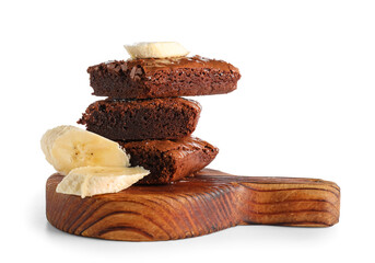Wooden board with pieces of tasty chocolate brownie isolated on white background