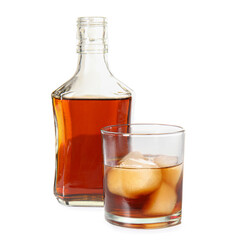 Bottle and glass of cold rum on white background