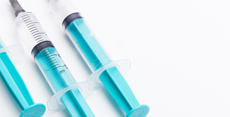 Disposable plastic syringe prepared for injection and vaccination in the hospital. The concept of medicine and health