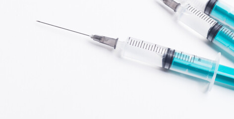 Disposable plastic syringe prepared for injection and vaccination in the hospital. The concept of...