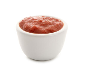 Bowl with tasty tomato paste on white background