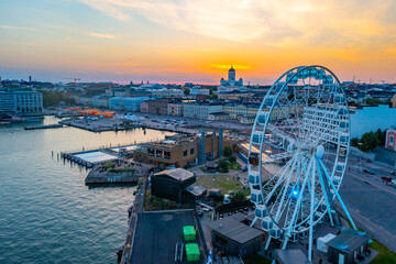 Sunset panorama of Helsinki from behind the ferris wheel, Finland