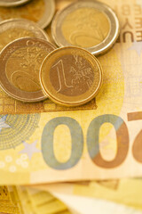 Money and finance.Euro background.Euro banknotes and euro coins close-up.Expenses and incomes in European countries.