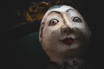 scary antique clown doll head