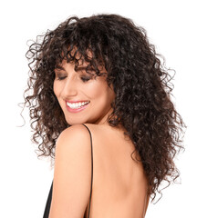 Beautiful young woman with long curly hair on white background
