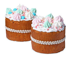 Traditional Easter cakes with meringues on white background