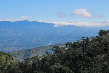 Landscape of forests and Talamanca mountain range in the background from Coto Brus, Costa Rica - obrazy, fototapety, plakaty
