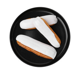 Delicious eclairs covered with glaze isolated on white, top view