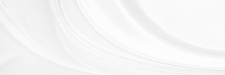 White gray satin texture that is white silver fabric silk panorama background with beautiful soft blur pattern natural.