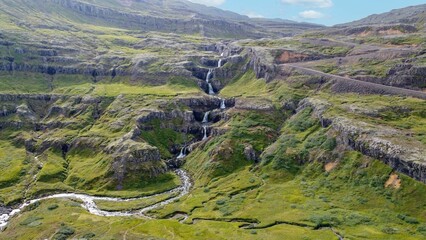 Landscape view with Klifbrekku waterfall view on a sunny day