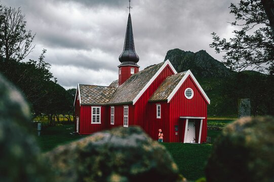 Scenic view of the Flakstad Church in Nordland, Norway on a gloomy day