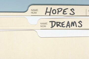 Close-up shot of folders named HOPES and DREAMS