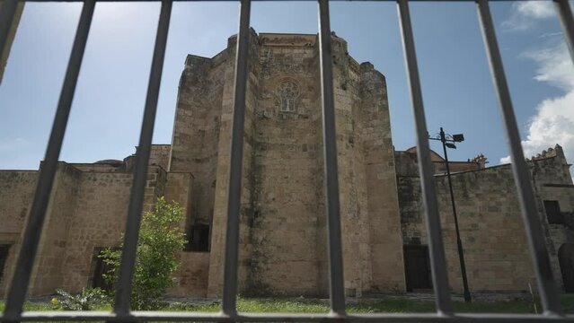 Shot through fence of Nuestra Senora de la Encarnacion Cathedral, UNESCO World Heritage Site, Santo Domingo, Dominican Republic, West Indies, Caribbean, Central America