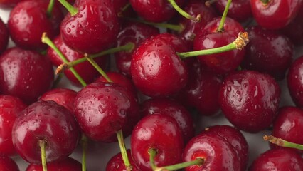 Closeup footage of juicy newly cleaned cherries