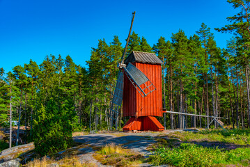 Red windmill at Open-air Museum Jan KarlsgГҐrden at Kastelholm at Aland islands in Finland