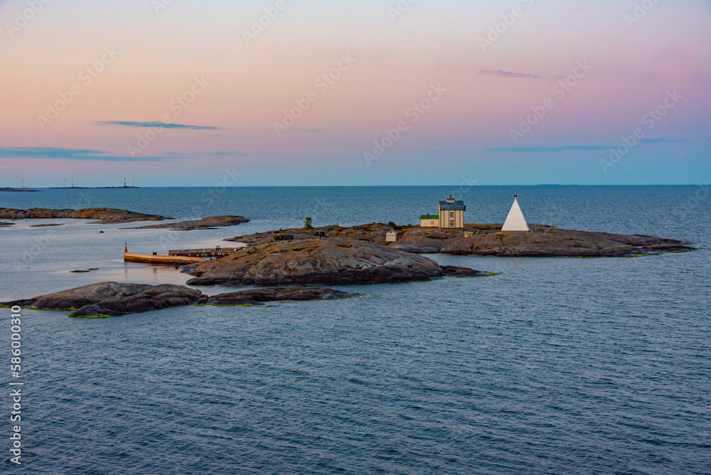 Wall mural sunrise over kobba klintar pilot station at aland islands in finland