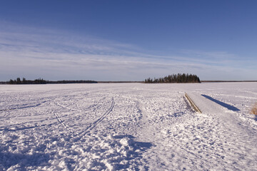 Fototapeta na wymiar Astotin Lake on a Sunny Winter Day