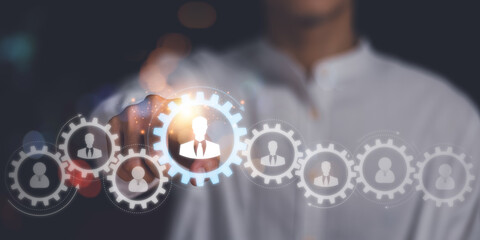 businessman pointing virtual icon ,team business success concept ,cooperation and support colleagues ,brainstorming,corporate teamwork ,Successful business team ,business partner connection