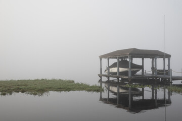 boat on a foggy lake