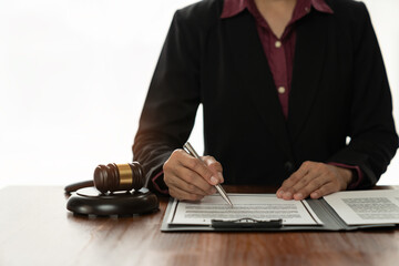 Fototapeta premium Female lawyer, legal consultant, asian businesswoman checking documents before signing venture capital business finance legal services concept in office.