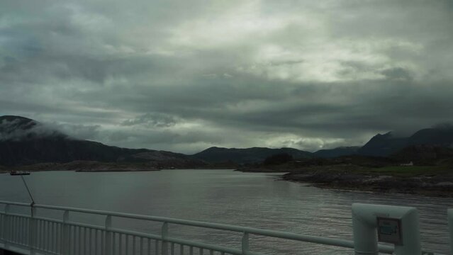 View From Cruising Ferry Of Norwegian Island Onoy With Overcast In Luroy, Norway. wide