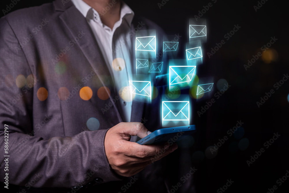 Aufkleber businessman using smart phone sending email on virtual screen, email marketing concept, sending mass e-mails or digital newsletter to manage relationship with customers