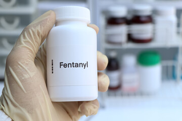 Fentanyl pill in white bottle, pill stock