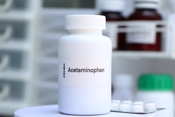 Acetaminophen pill in white bottle, pill stock