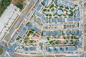 new residential district. multistory apartment houses with children playgrounds. aerial view.