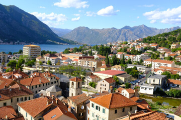 Naklejka na ściany i meble Kotor Montenegro. Boko Kotor Bay panoramic view. Beautiful summer day with blue sky and clouds. 