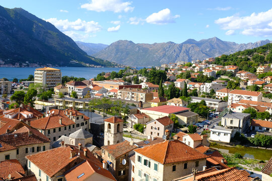 Kotor Montenegro. Boko Kotor Bay panoramic view. Beautiful summer day with blue sky and clouds.
