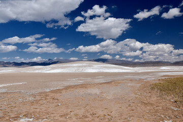 Tecopa Hot Springs in southern California on a sunny day, near the Mojave desert south of Death Valley. Cloudy blue sky