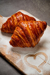 fresh croissants on the plate