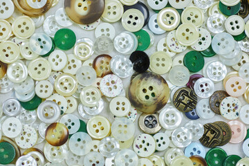 A set of assorted buttons of different colors. The concept of hobbies and crafts.