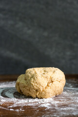 Bakery - yeast dough for bread, pizza or scone on a floured surface, with flour splash. Cooking bread. Kneading the Dough. Long banner format