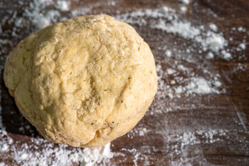 Bakery - yeast dough for bread, pizza or scone on a floured surface, with flour splash. Cooking bread. Kneading the Dough. Long banner format