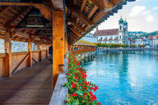 Kapellbruecke with Francis Xavier church at Swiss town Luzern