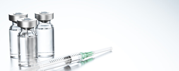 Syringe is lying next to the medical ampoules. Medicine inside a medical bottle. Medicine bottle mockup. Vaccination. An injection of insulin. Life-saving drugs. 3d render.