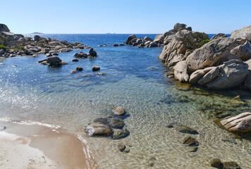 Tamaricciu beach, beautiful Mediterranean beach dotted with rocks along the entire coast, Porto Vecchio, Corsica, France