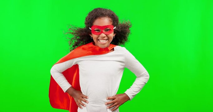 Happy, face and a superhero girl on a green screen isolated on a studio background. Smile, power and portrait of a child in a costume, playing and dressing up for halloween with mockup space