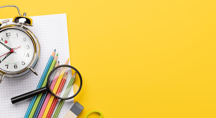 School supplies and stationery on yellow