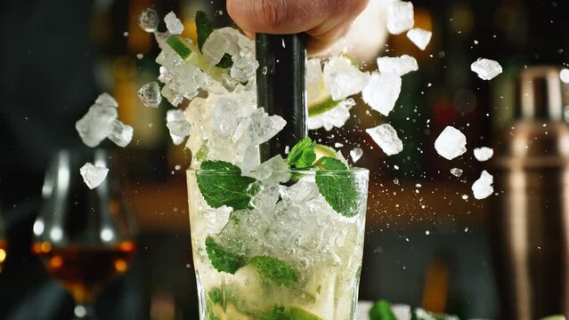 Super Slow Motion Shot of Prepairing Fresh Mojito Drink on Bar With Camera Motion at 1000fps