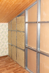 Insulation and glass wool in the wall of the room
