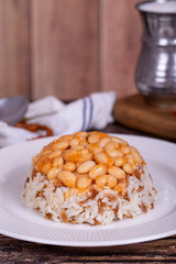 Dry bean pilaf. Prepared with the perfect harmony of dry beans and rice, this dish is both nutritious and satisfying. Traditional Turkish cuisine. Local name kuru fasulye pilav. Close up