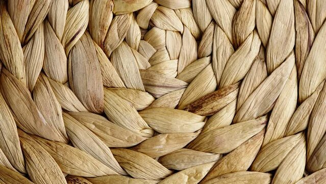 Detailed close-up of a wicker wooden box texture, showcasing the beauty and uniqueness of the natural wood grain. Ideal for backgrounds or textures.