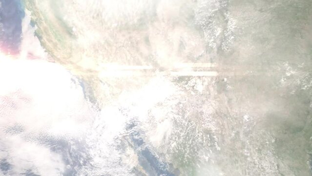 Earth zoom in from outer space to city. Zooming on Florence, Arizona, USA. The animation continues by zoom out through clouds and atmosphere into space. Images from NASA