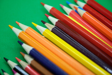 Fototapeta premium Assortment of Colorful Wooden Pencils Isolated on White Background for Art and School