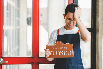 small business Turned closed sign. Crisis concept. Owner closed sign on bar or restaurant glass...