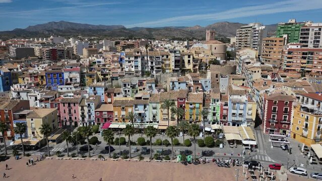 Aerial drone view of La Vila Joiosa.Flying over colorful houses on the Mediterranean coast in the city of La Vila Joiosa in Spain.Costa Blanca.