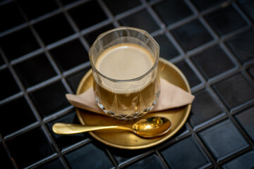 Top view of trendy latte coffee cup